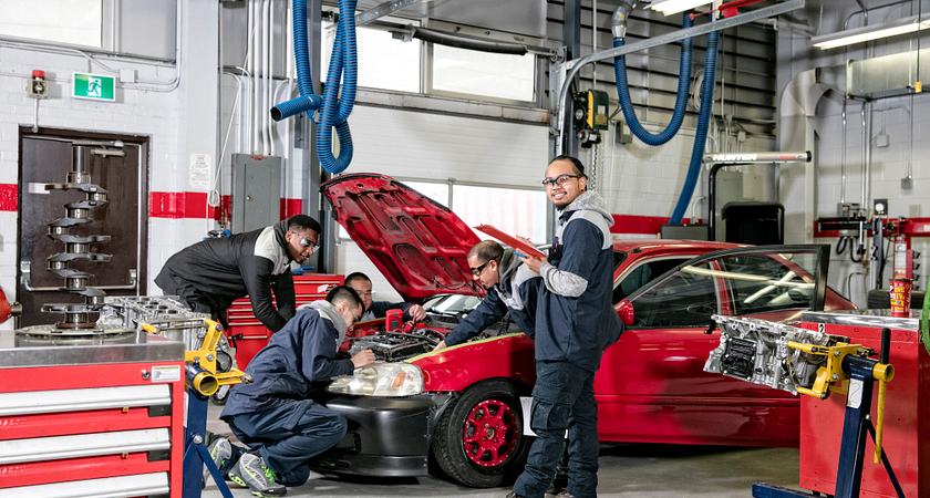 Auto mechanic doing car safety inspection in Brampton
