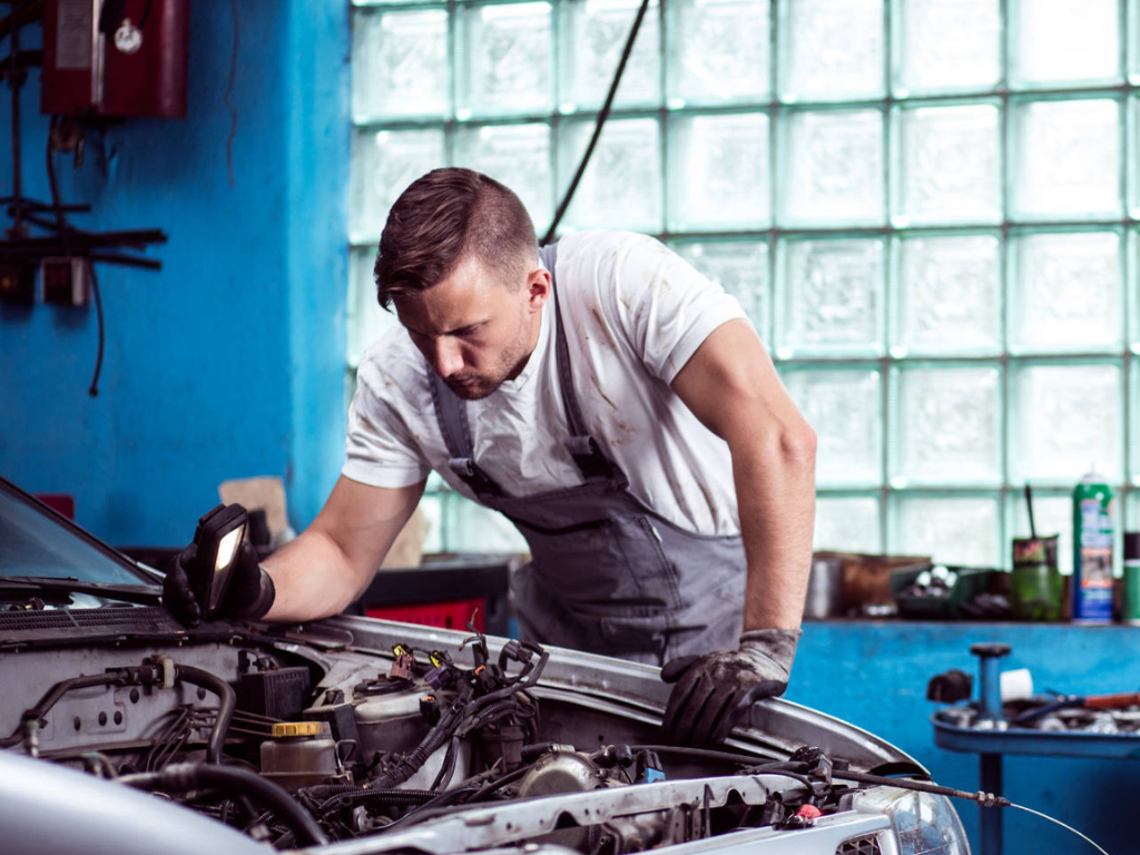 A car mechanic repairing car